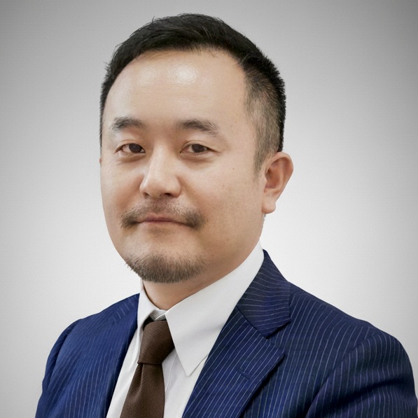 飯塚 隆夫の顔写真